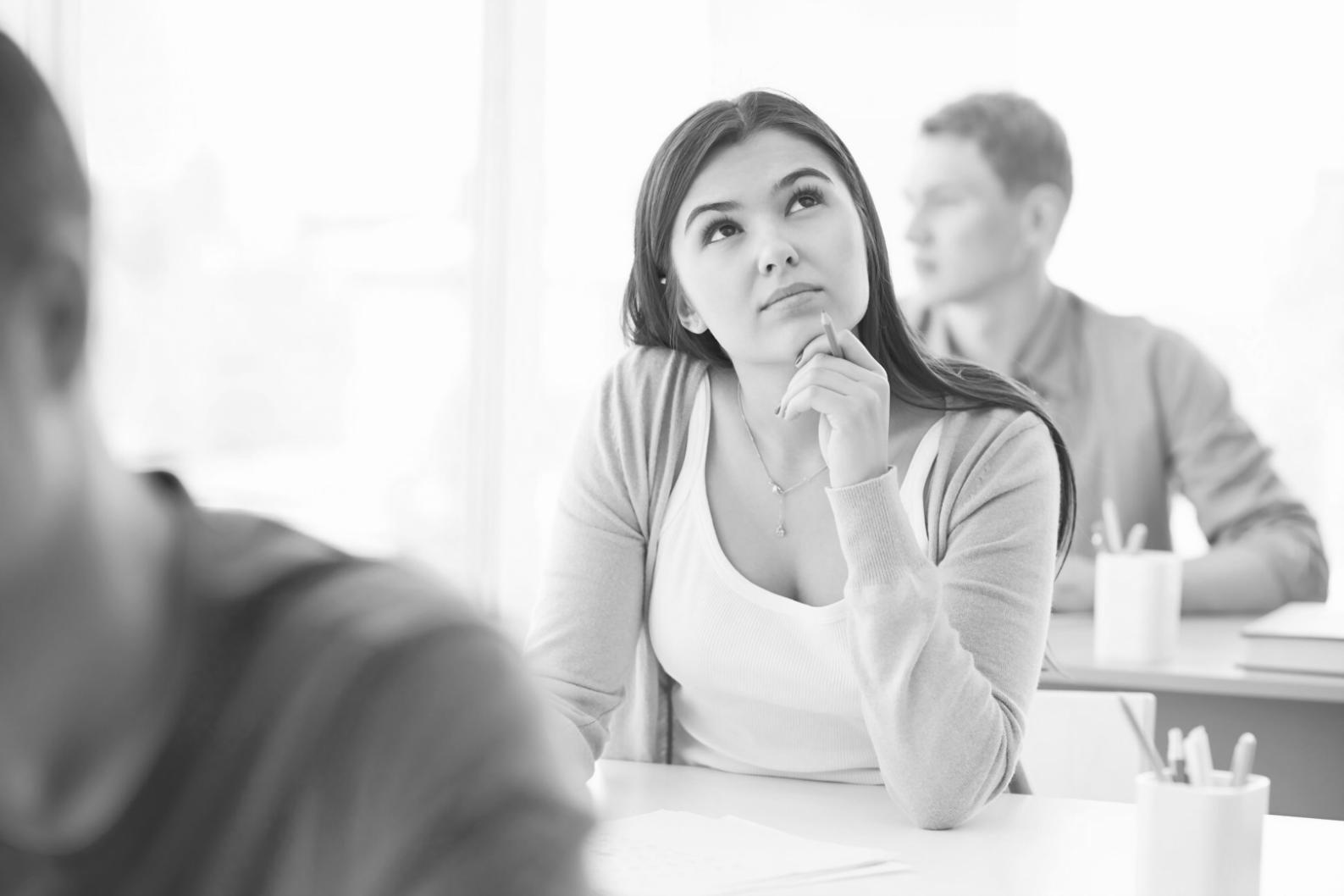 Business team analyzing financial projections on computer screen